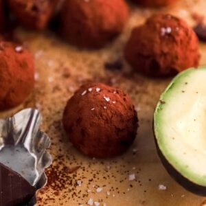 Decadent-chocolate-avocado-truffles,-rolled-in-cocoa-powder-and-topped-with-a-shimmery-finish