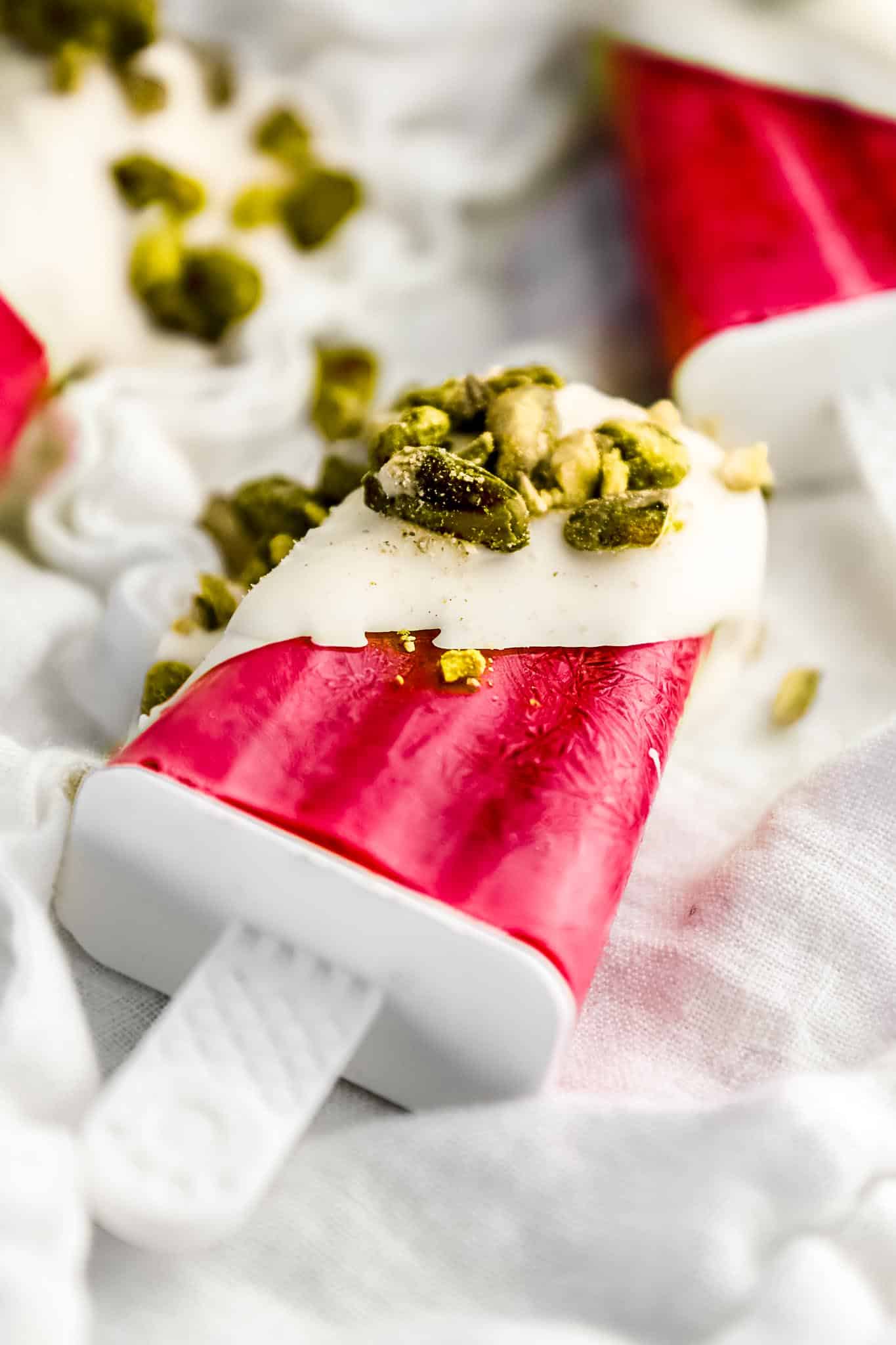 Creamy-kefir-cherry-popsicles-with-white-chocolate-coating