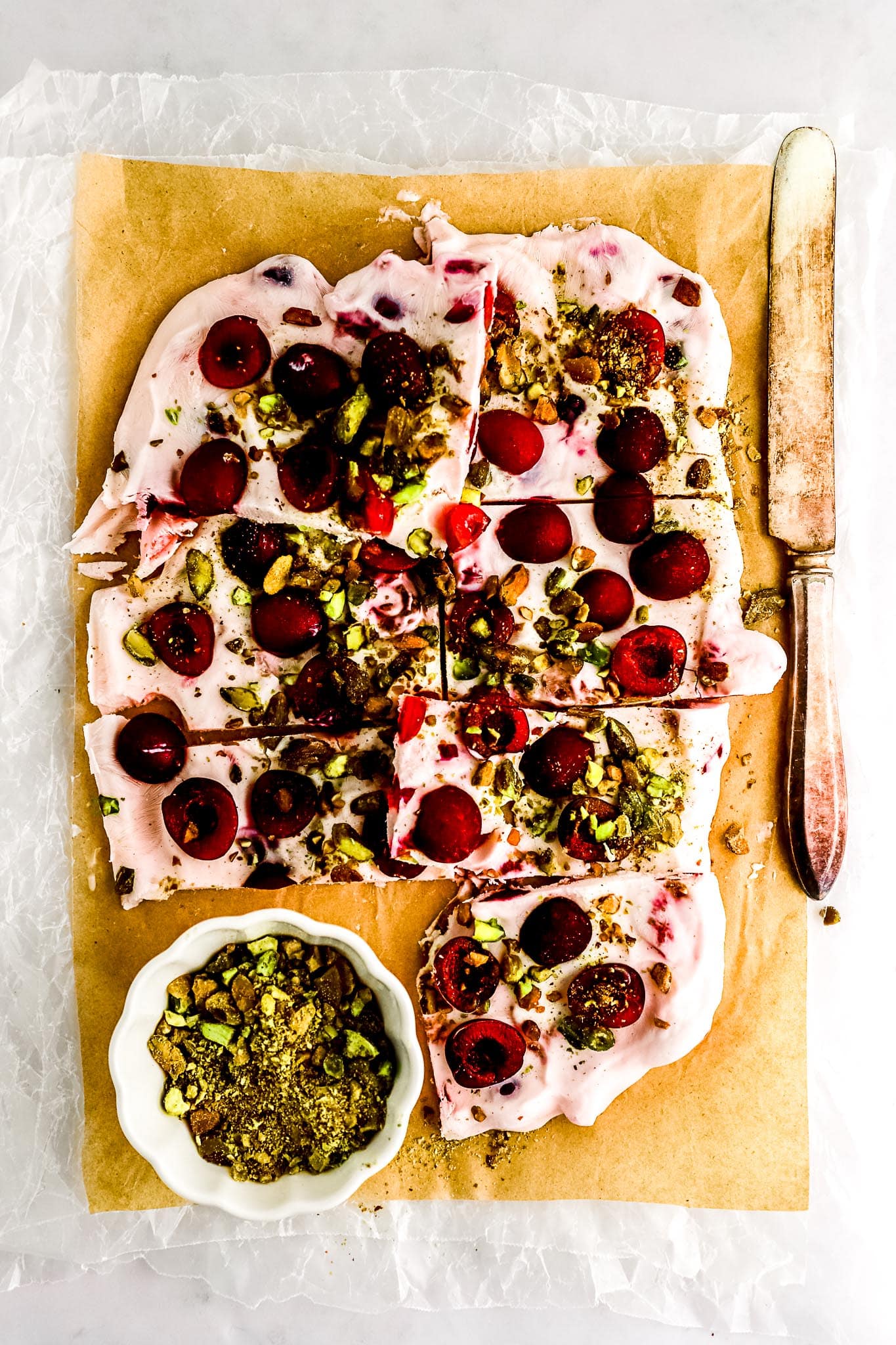 frozen-yogurt-bark-topped-with-fresh-cherries-and-crushed-pistachios