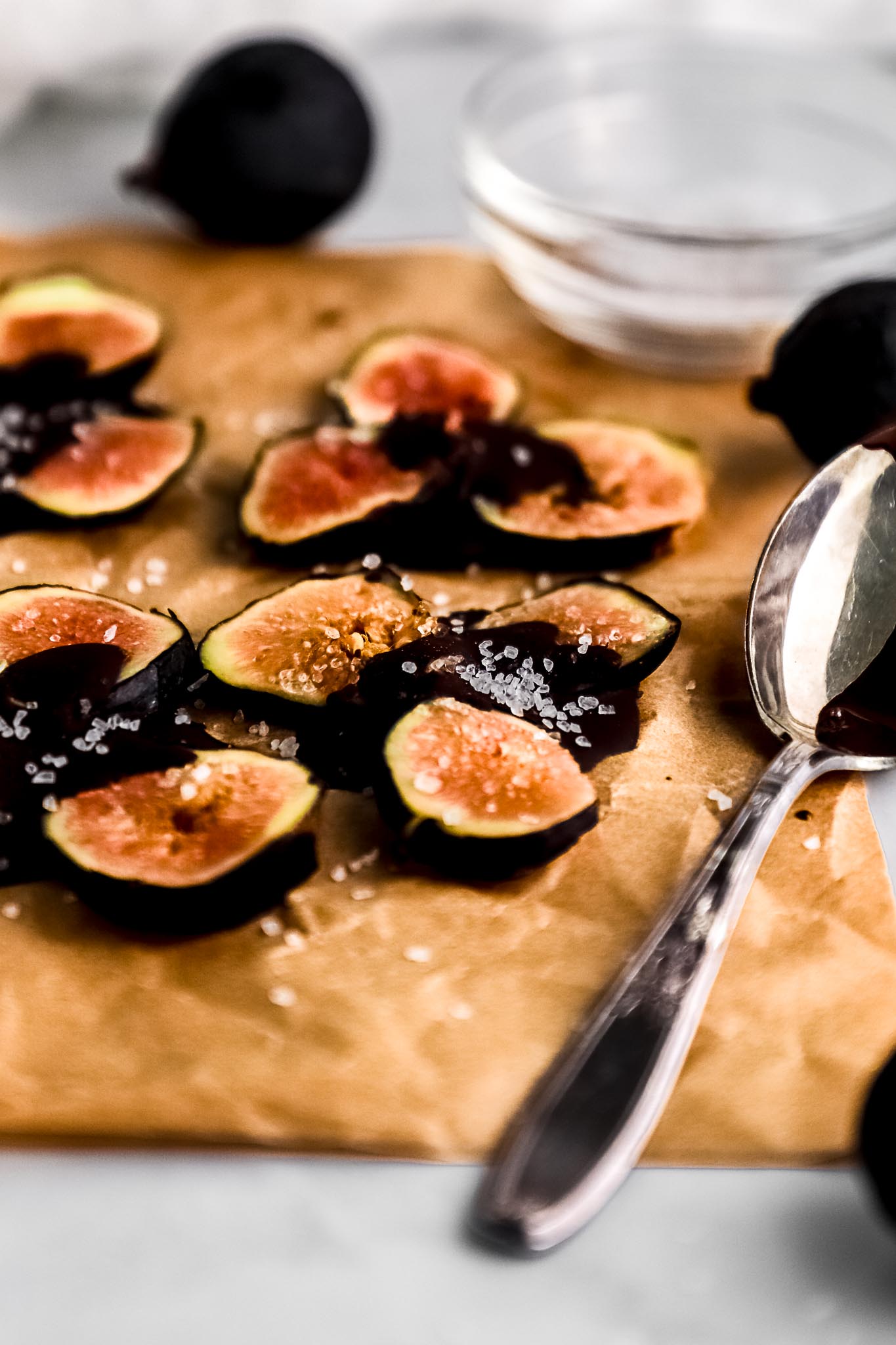 chocolate-covered-fig-flowers-arranged-on-parchment-paper