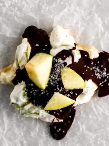 gluten-free-apple-bark-pieces-scattered-on-parchment