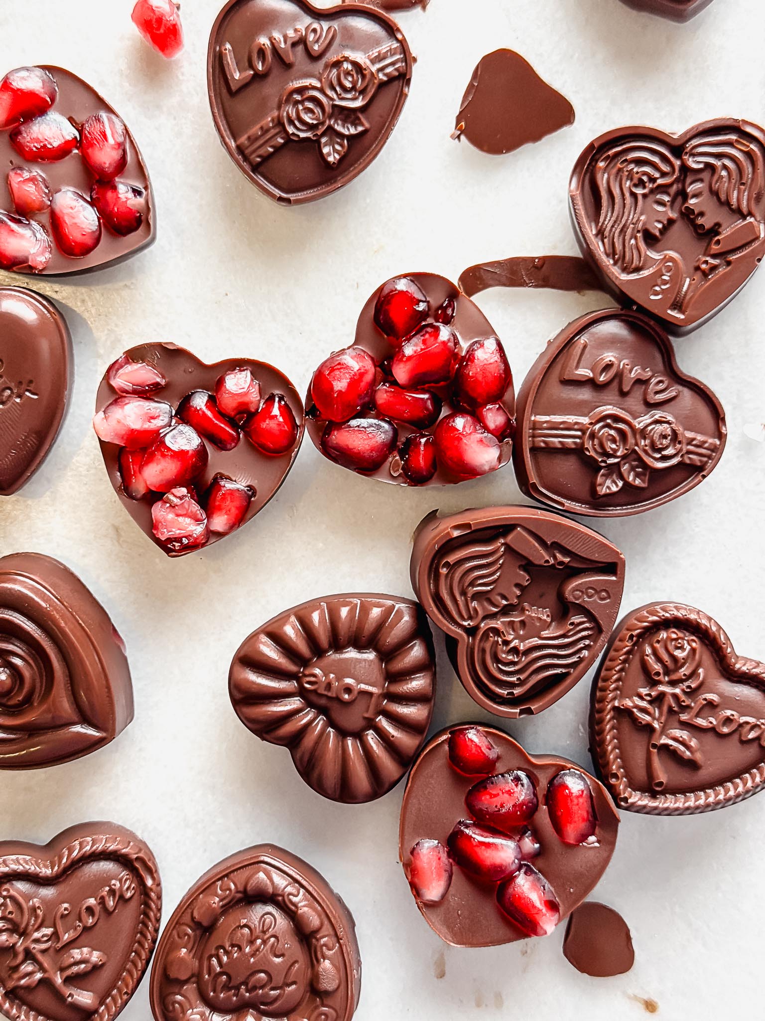 gluten-free-chocolate-hearts-with-pomegranate-arils-overhead